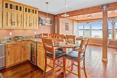 Experience high-end, turn-key, low-maintenance lake living on - photo 9
