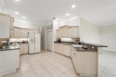 Located in the prestigious gated community of Lake Forest at - photo 5