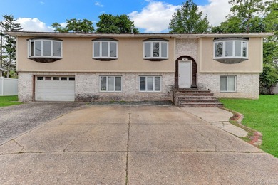 Hi-Ranch Style Home. This Home Features 6 Bedrooms, 2 Full Baths - photo 1