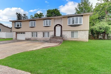 Hi-Ranch Style Home. This Home Features 6 Bedrooms, 2 Full Baths - photo 2