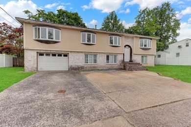 Hi-Ranch Style Home. This Home Features 6 Bedrooms, 2 Full Baths - photo 3