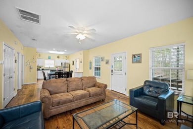 This beautifully maintained 3-bedroom, 2-bath cottage offers the - photo 11