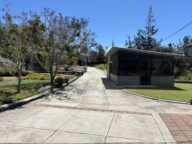 Perched atop a private hilltop with Pacific Ocean views, this - photo 12