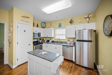 This beautifully maintained 3-bedroom, 2-bath cottage offers the - photo 15