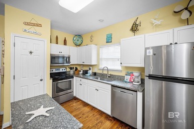 This beautifully maintained 3-bedroom, 2-bath cottage offers the - photo 16