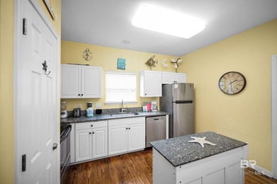 This beautifully maintained 3-bedroom, 2-bath cottage offers the - photo 17