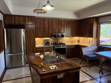 Perched atop a private hilltop with Pacific Ocean views, this - photo 22