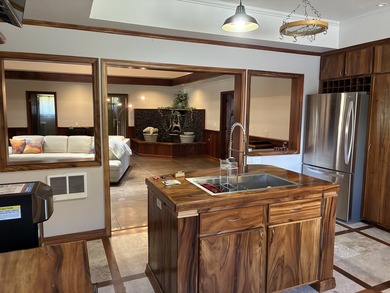Perched atop a private hilltop with Pacific Ocean views, this - photo 23