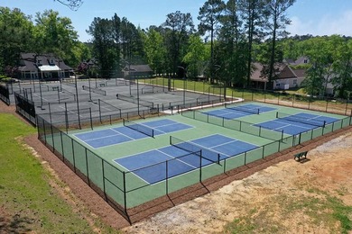 Nestled within the prestigious gated community of The Plantation - photo 7