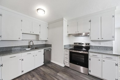 Fully renovated and move-in ready! This 4-bedroom, 2-bath home - photo 2