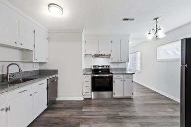 Fully renovated and move-in ready! This 4-bedroom, 2-bath home - photo 10
