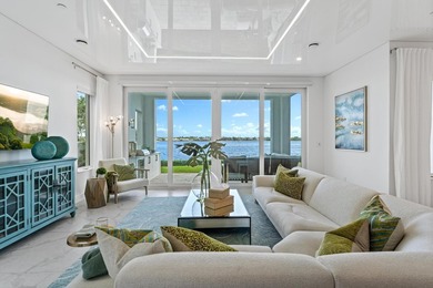 Move-in ready, this waterfront corner villa offers VIEWS - photo 3