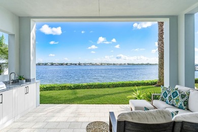 Move-in ready, this waterfront corner villa offers VIEWS - photo 9