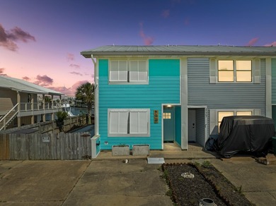 Waterfront living meets beach lifestyle in this beautifully - photo 3