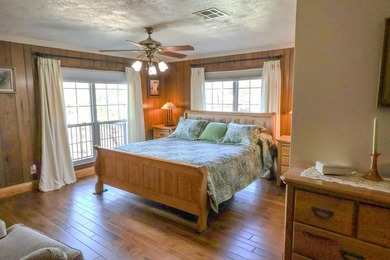 A refined waterfront retreat showcasing custom materials - photo 6