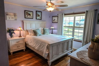 A refined waterfront retreat showcasing custom materials - photo 9