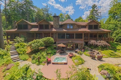 Set along the pristine shores of private Friends Lake in the - photo 1