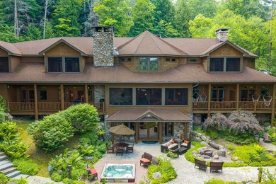 Set along the pristine shores of private Friends Lake in the - photo 2