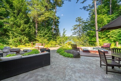 Set along the pristine shores of private Friends Lake in the - photo 6
