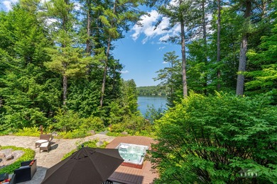 Set along the pristine shores of private Friends Lake in the - photo 7