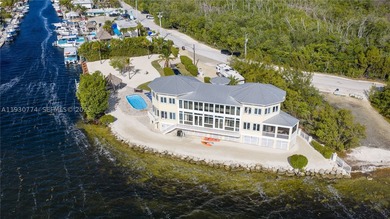 57 Garden Cove Drive is a rare Key Largo waterfront compound set - photo 25
