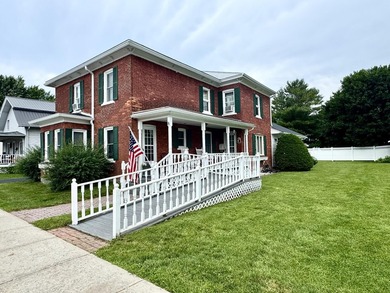 Nestled in the heart of the Village of Rouses Point, this - photo 1