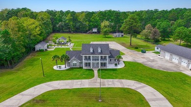 Exceptional all-brick estate set on 3.47 acres in a private - photo 1