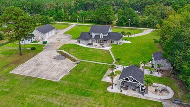 Exceptional all-brick estate set on 3.47 acres in a private - photo 2