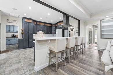 Exceptional all-brick estate set on 3.47 acres in a private - photo 8