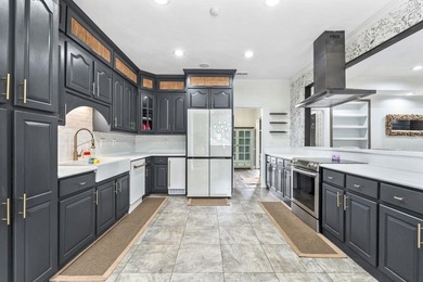 Exceptional all-brick estate set on 3.47 acres in a private - photo 9