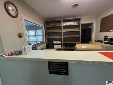 This charming small office building is the perfect canvas for