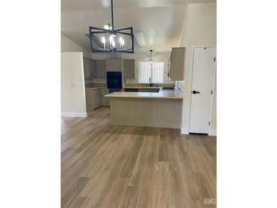 Welcome to 3386 Greenacre Drive! This spacious 3-bedroom - photo 5