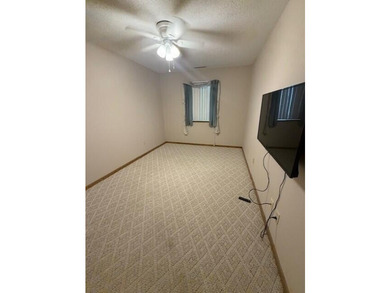 Main floor condo with enclosed patio on the north side of the - photo 21