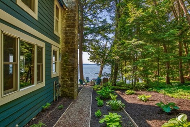 Set on the shores of Lake Champlain in Westport, this classic - photo 6