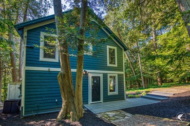 Set on the shores of Lake Champlain in Westport, this classic - photo 9