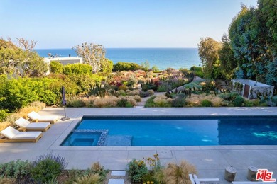 Set on a bluff above Broad Beach, this Balinese-inspired - photo 1