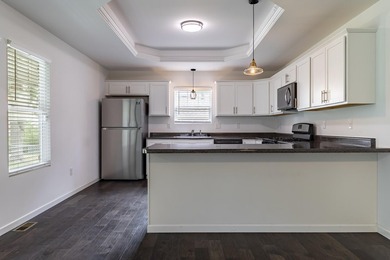 9 YEAR YOUNG RANCH HOME IN BEAUTIFUL LAKES OF THE FOUR SEASONS - photo 11