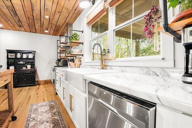 Completely renovated and full of character! This one of a kind - photo 9