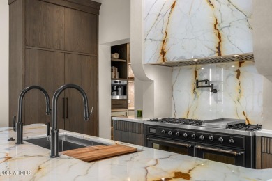 An absolute STUNNER! Nestled in a private cul-de-sac with