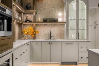 An absolute STUNNER! Nestled in a private cul-de-sac with