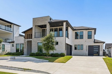 Discover elevated lakeview living in the prestigious Heath Golf - photo 1