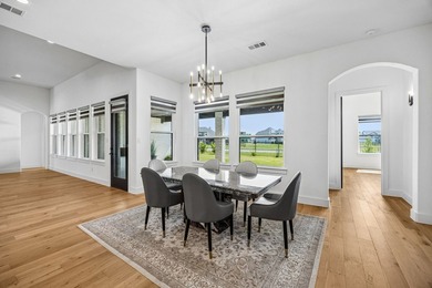 Discover elevated lakeview living in the prestigious Heath Golf - photo 4