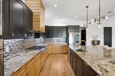 Discover elevated lakeview living in the prestigious Heath Golf - photo 9