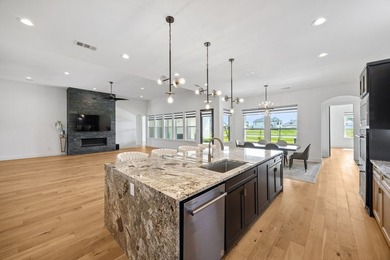 Discover elevated lakeview living in the prestigious Heath Golf - photo 10