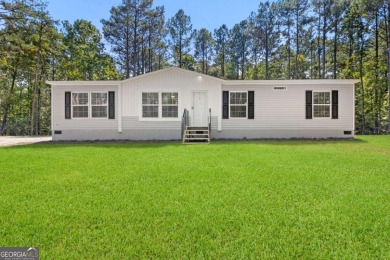 Lake Home For Sale in Eatonton, Georgia