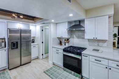Completely remodeled and loaded with upgrades, this stunning 3 - photo 13