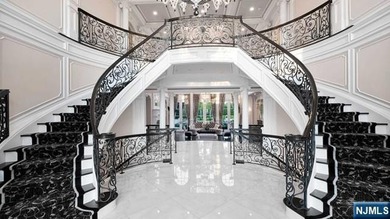 Welcome to this custom-built estate situated high atop the - photo 4