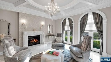 Welcome to this custom-built estate situated high atop the - photo 6