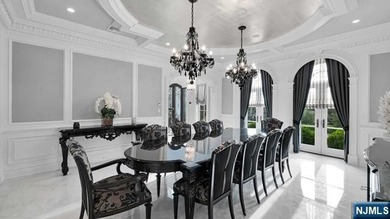 Welcome to this custom-built estate situated high atop the - photo 7