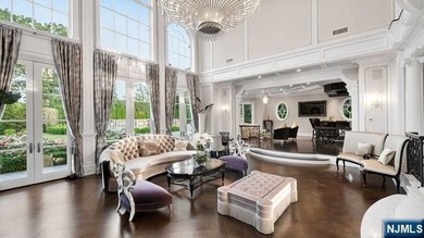 Welcome to this custom-built estate situated high atop the - photo 9